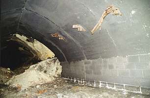 One damaged tunnel of Kellerbau I with concreted roof on February 24, 2001 (Source: GMC publication "St. Georgen-Gusen-Mauthausen â Concentration Camp Mauthausen Reconsidered")